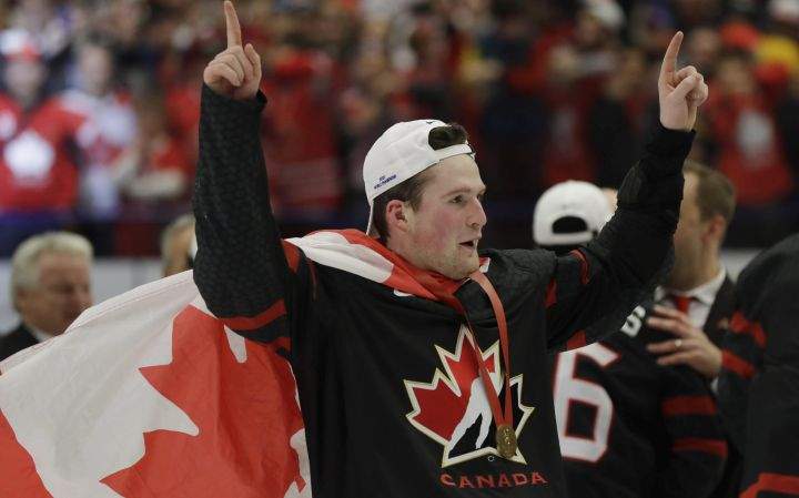 Canada's Alexis Lafreniere celebrates after winning the U20 Ice Hockey Worlds gold medal match between Canada and Russia in Ostrava, Czech Republic, Sunday, Jan. 5, 2020. 