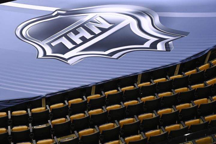 An NHL logo is shown along with empty seats prior to NHL Eastern Conference Stanley Cup playoff hockey action between the Washington Capitals and New York Islanders in Toronto on Friday, August 14, 2020. 