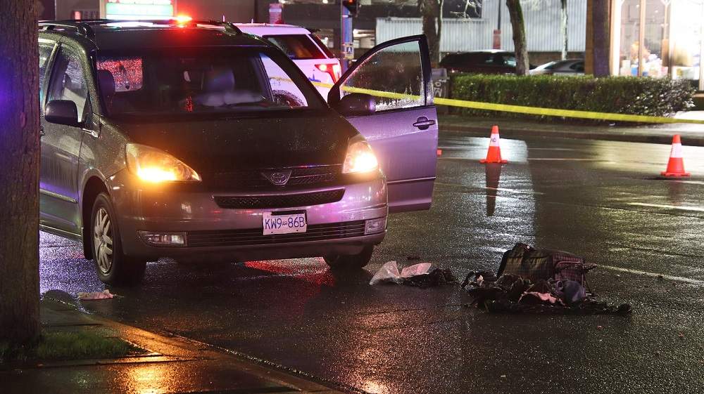 Richmond RCMP at the scene of a collision between a vehicle and a pedestrian that sent a 70-year-old woman to hospital with serious injuries.