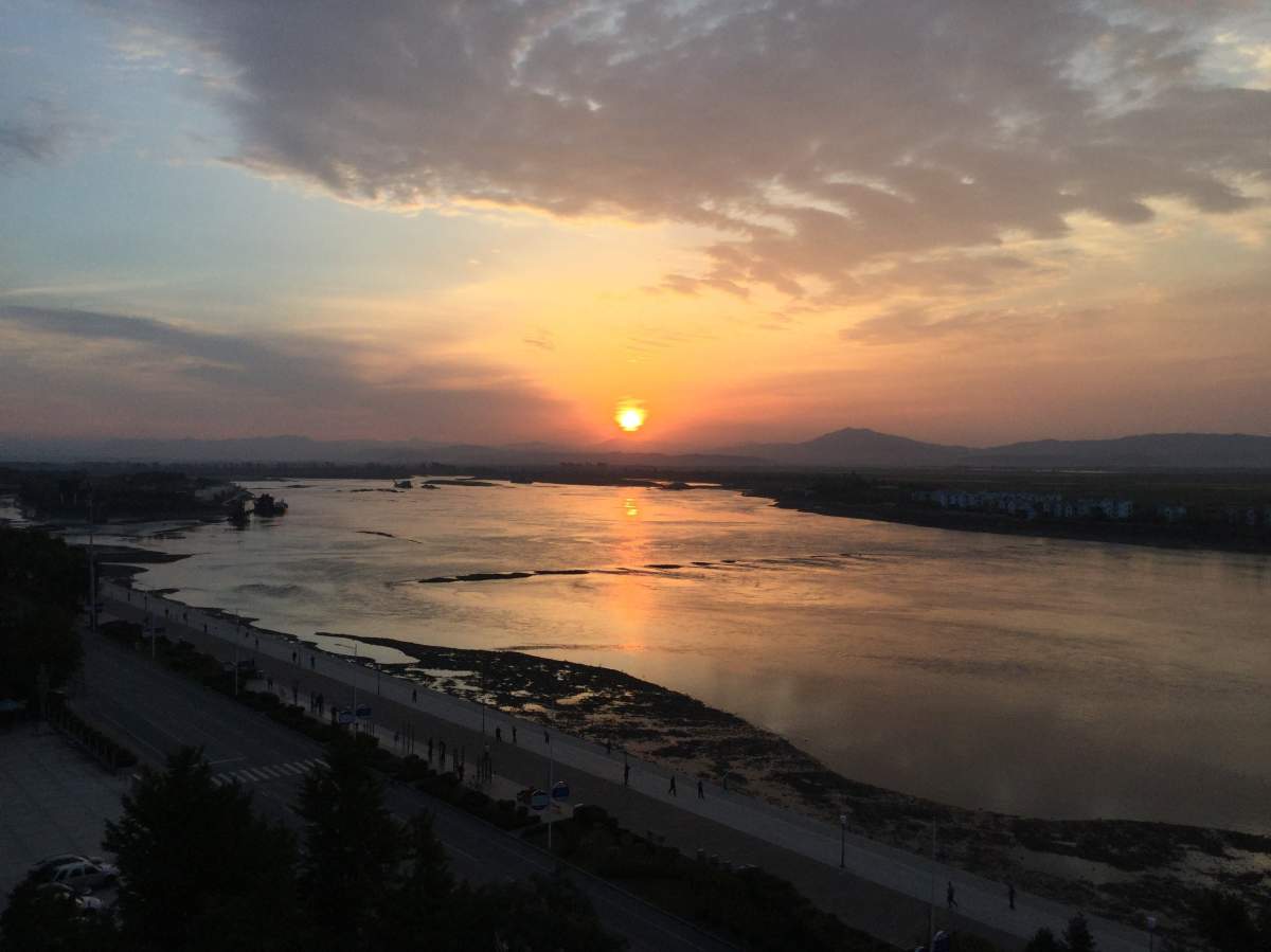 View of North Korea from the Garratt’s old apartment in Dandong, China.