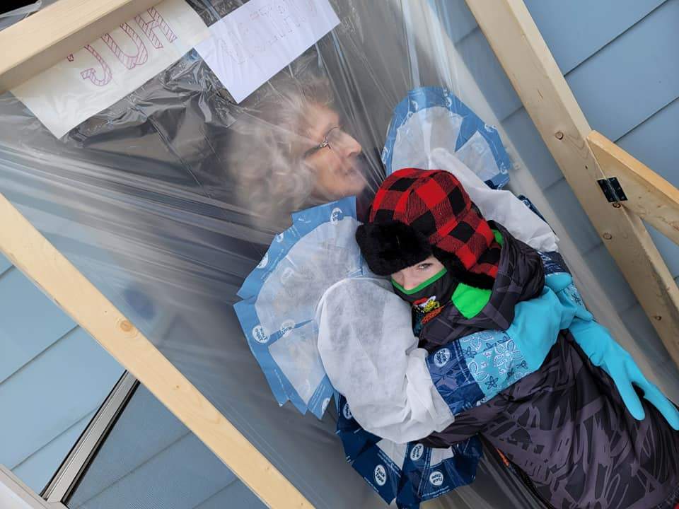 Lou MacDonald, 95, was surprised Christmas morning with a hugging station.