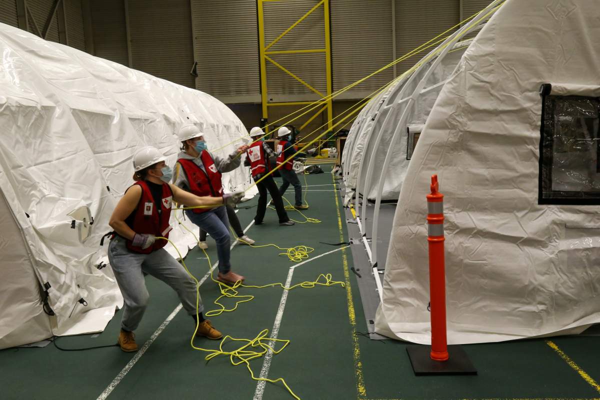 Work to set up an Alternate Care Centre (ACC) at the Butterdome on the University of Alberta campus in Edmonton, Alta.