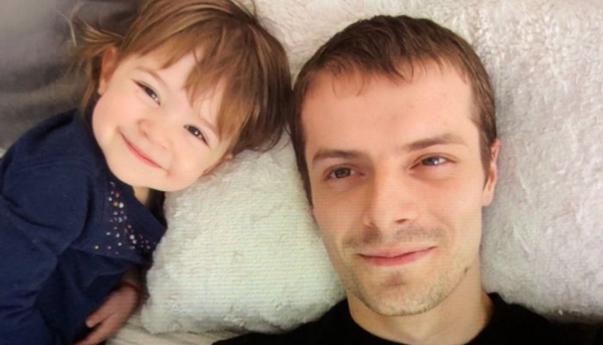 Dima Serbulenco pictured with his three-year-old daughter Zinovia.