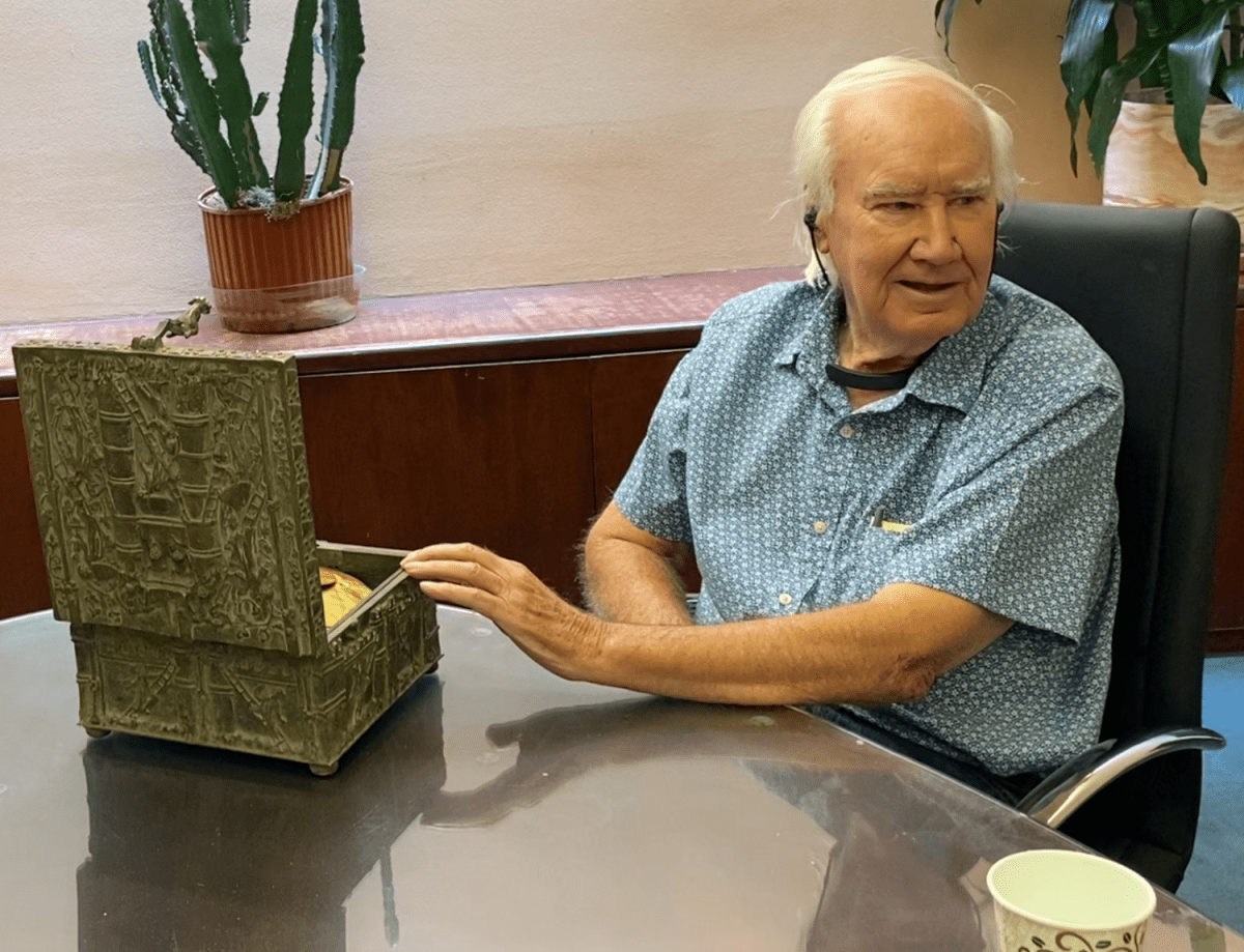 Forrest Fenn is shown with a chest he hid 10 years ago.