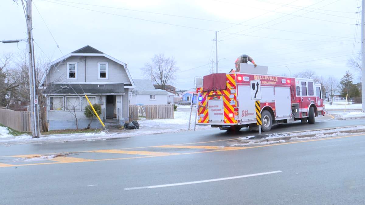 Fire crews outside 233 Moira St. West, Belleville.