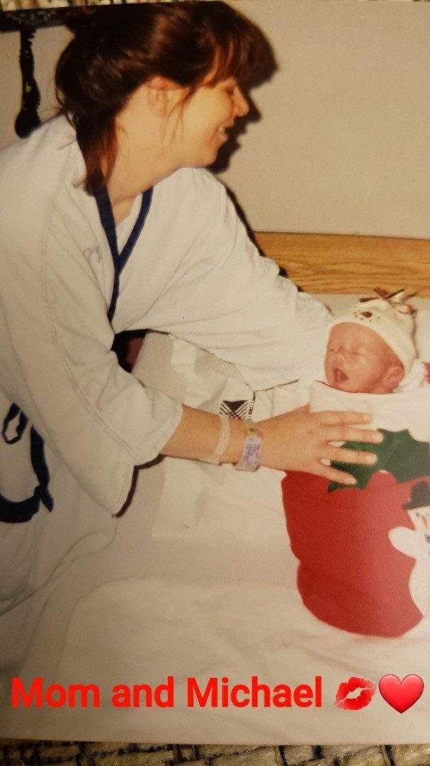 Michael Barata as a newborn with his mother, Cheryl Barata.