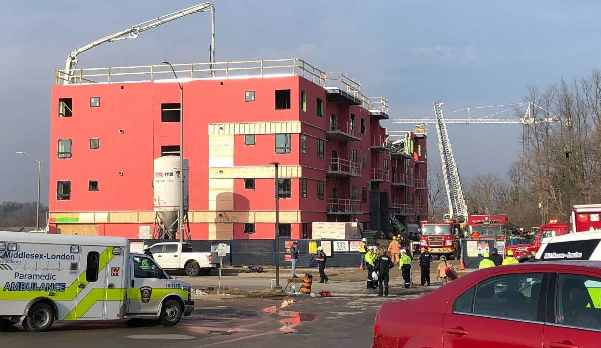 Emergency services on scene at a building under construction.