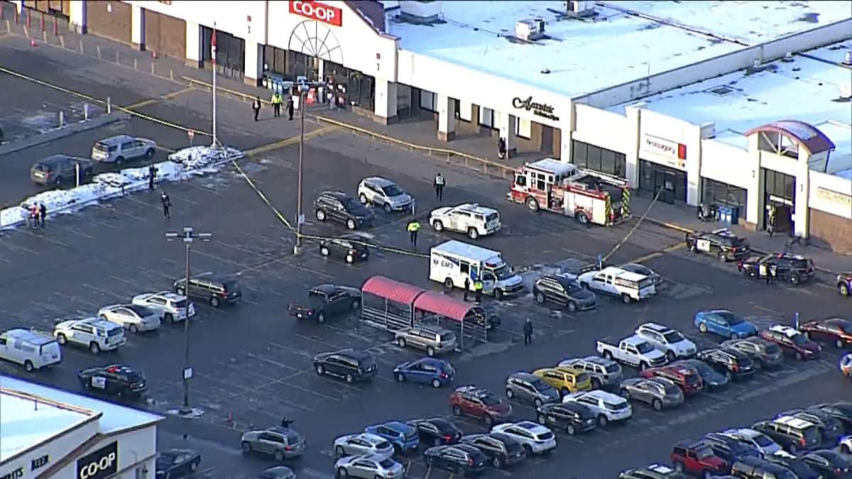 Emergency responders at the scene of a pedestrian-vehicle collision at a Co-op in Oakridge.
