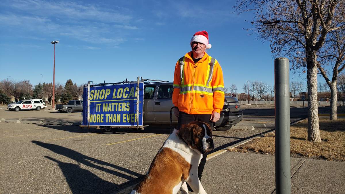 Steve, the organizer, poses in front of his truck at the ENMAX Centre parking lot in Lethbridge.