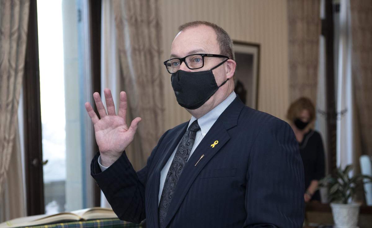 Ric McIver is sworn in as Alberta's minister of Municipal Affairs on Tuesday, Jan. 5, 2021.