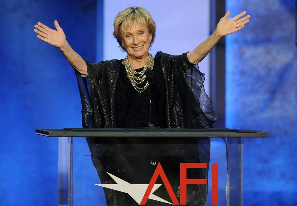 FILE – Actress Cloris Leachman gestures to honoree Mel Brooks in the audience during the American Film Institute’s 41st Lifetime Achievement Award Gala on June 6, 2013, in Los Angeles.