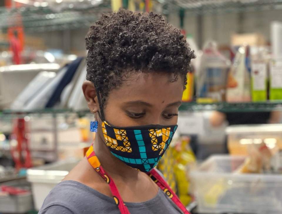 Asha Wheeldon, owner of Kula Kitchen, preps food in a commissary kitchen in Vancouver (Makim Talwalker/Supplied). 