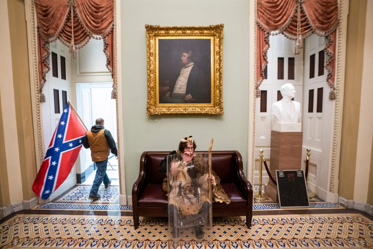 Supporters of US President Donald J. Trump outside the senate chambers after breaching Capitol security in Washington, DC, USA, 06 January 2021. – EPA/JIM LO SCALZO
