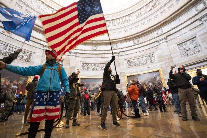 Supporters of US President Donald J. Trump in the Capitol Rotunda after breaching Capitol security in Washington, DC, USA, 06 January 2021.