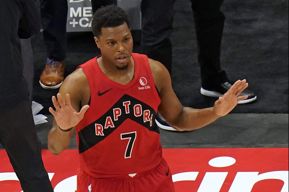 Toronto Raptors guard Kyle Lowry (7) reacts to a basket during the first half of an NBA basketball game against the Milwaukee Bucks Wednesday, Jan. 27, 2021, in Tampa, Fla. The basket put Lowry over the 10,000 point mark as a member of the Raptors.