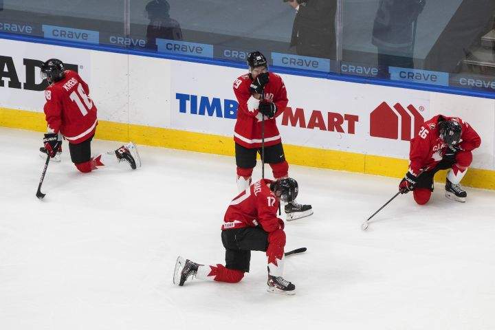 Canada players react after their loss to the United States in IIHF World Junior Hockey Championship gold medal game action in Edmonton on Tuesday, January 5, 2021.