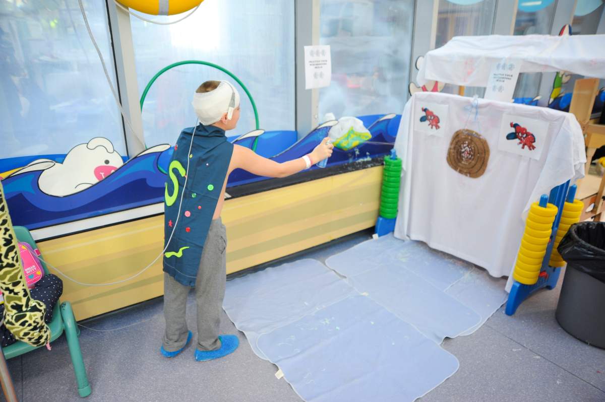 A child at the Stollery Children Hospital's "Beach" play room.