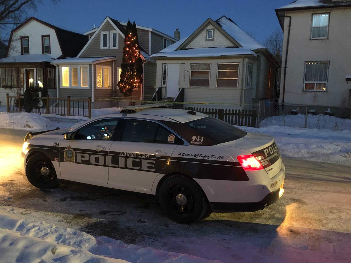 A police car outside a home on Craig Street Thursday night.