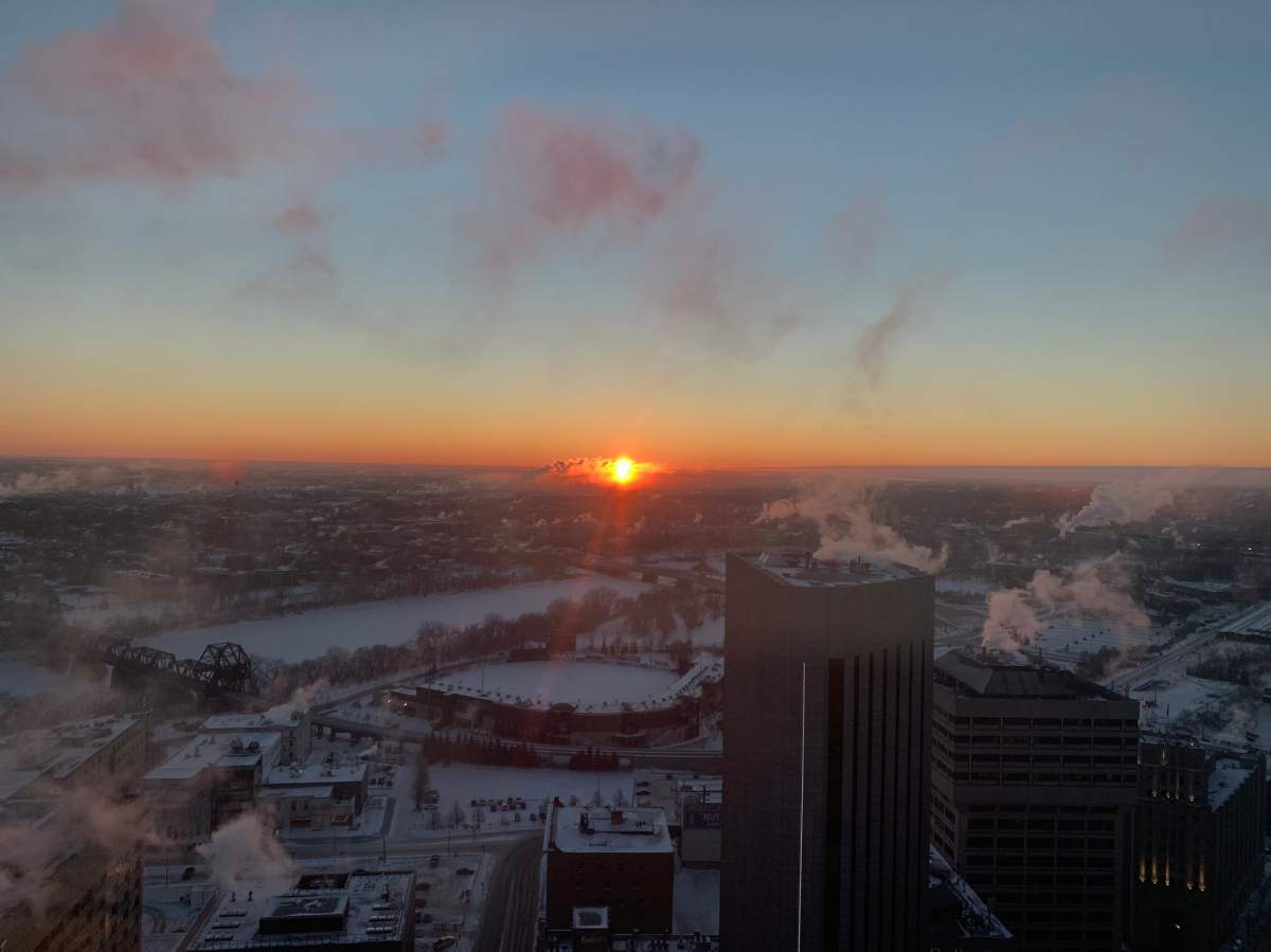 The sun rises on a frosty morning in Winnipeg on Tuesday, Jan. 26, 2021.