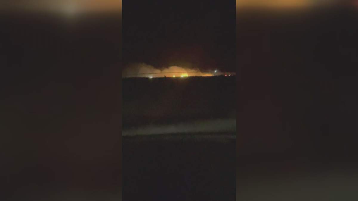 This photo posted by Michelle Smith shows a large fire burning near Fort Macleod late Tuesday.