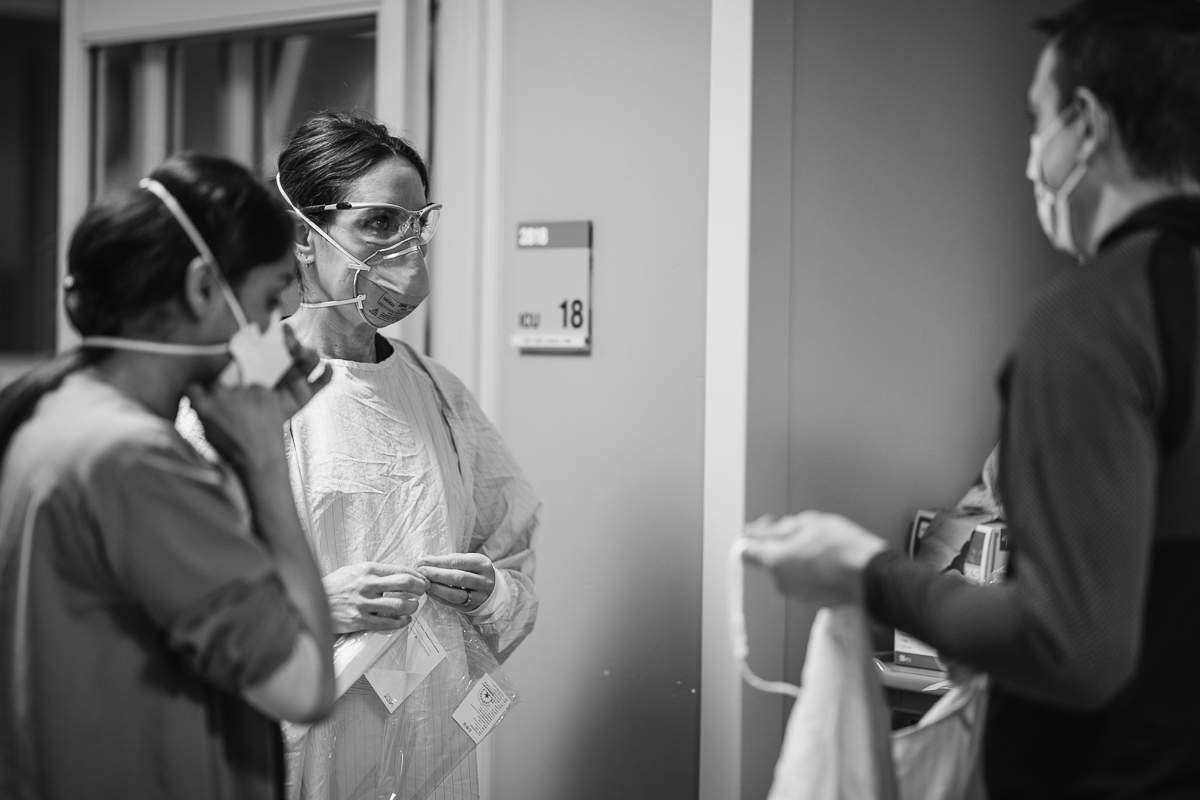 Dr. Dorrington speaking with colleagues.