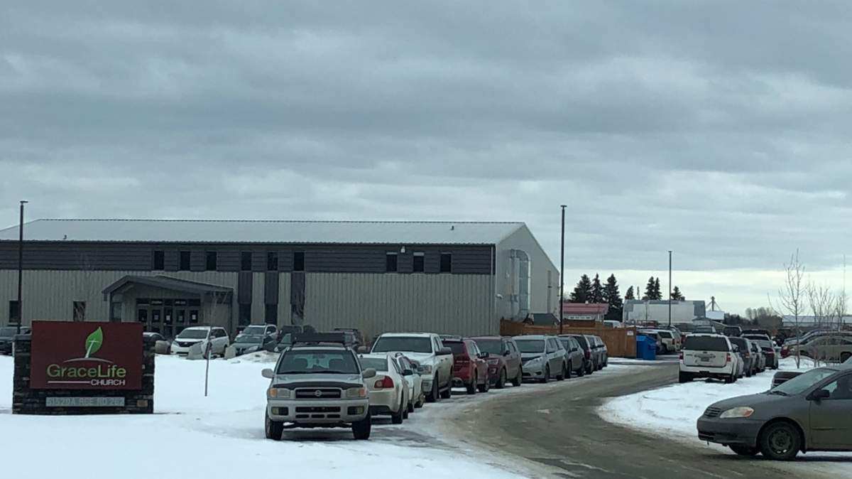 The crowded parking lot of Grace Life Church Of Edmonton in Parkland County, on Sunday, January 17, 2021.
