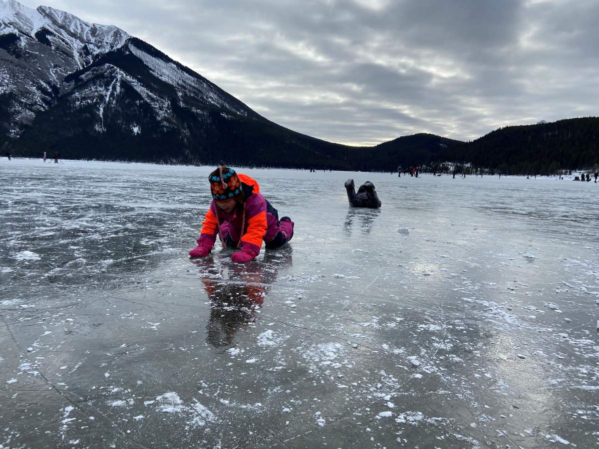 Parks Canada issues thin ice warning for people wanting to skate on Lake Minnewanka, Sunday, Jan. 24, 2021.