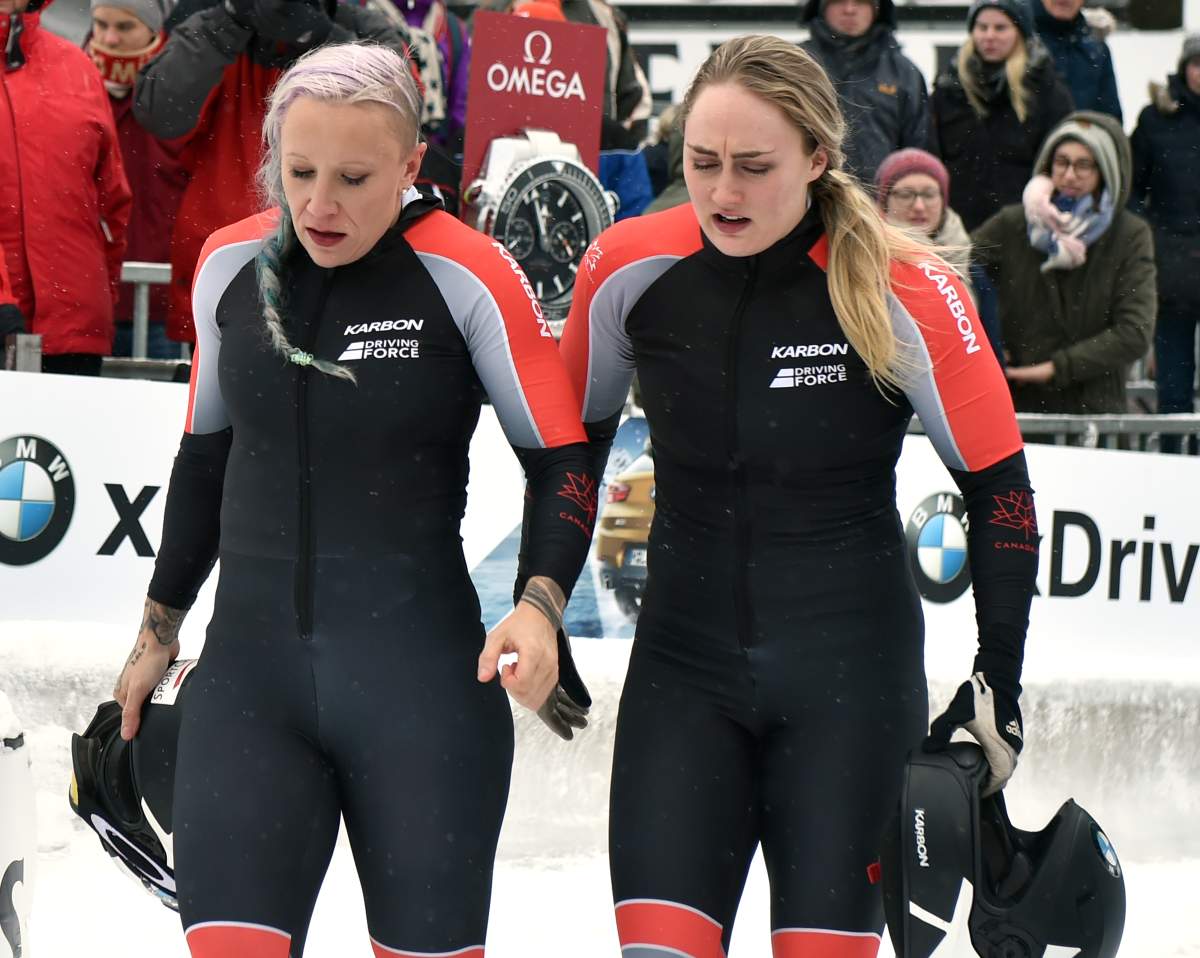 Canadian bobsleigh athletes Kaillie Humphries (L) and Melissa Lotholz (R) are visibly disappointed over their fourth place after the women’s two person bob event at the BMW IBSF World Cup in Winterberg, Germany on December 9, 2017.