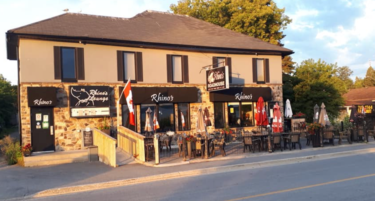 Two employees at Rhino's Roadhouse Restaurant have tested positive for COVID-19, management report.