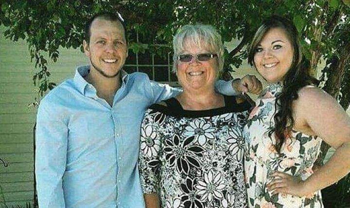 A photo of Rose Vandelannoite with her son Clinton and her daughter Kelsey.