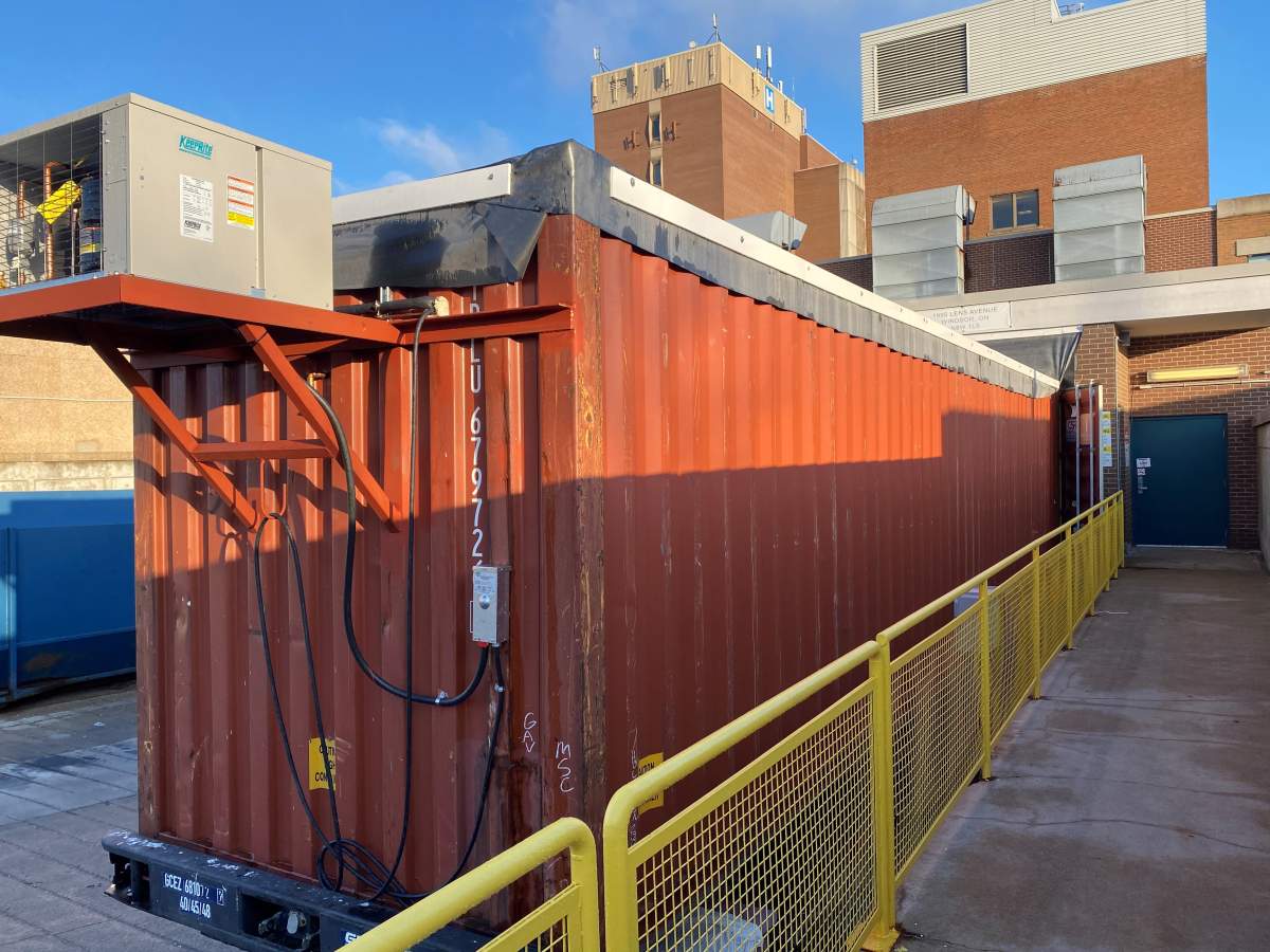 A trailer outside the Metropolitan campus, used to house bodies.