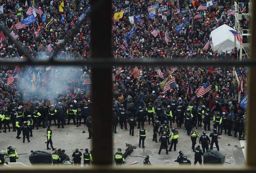 Police hold back supporters of U.S. President Donald Trump as they gather outside the US Capitol’s Rotunda on Jan. 6, 2021, in Washington, D.C.