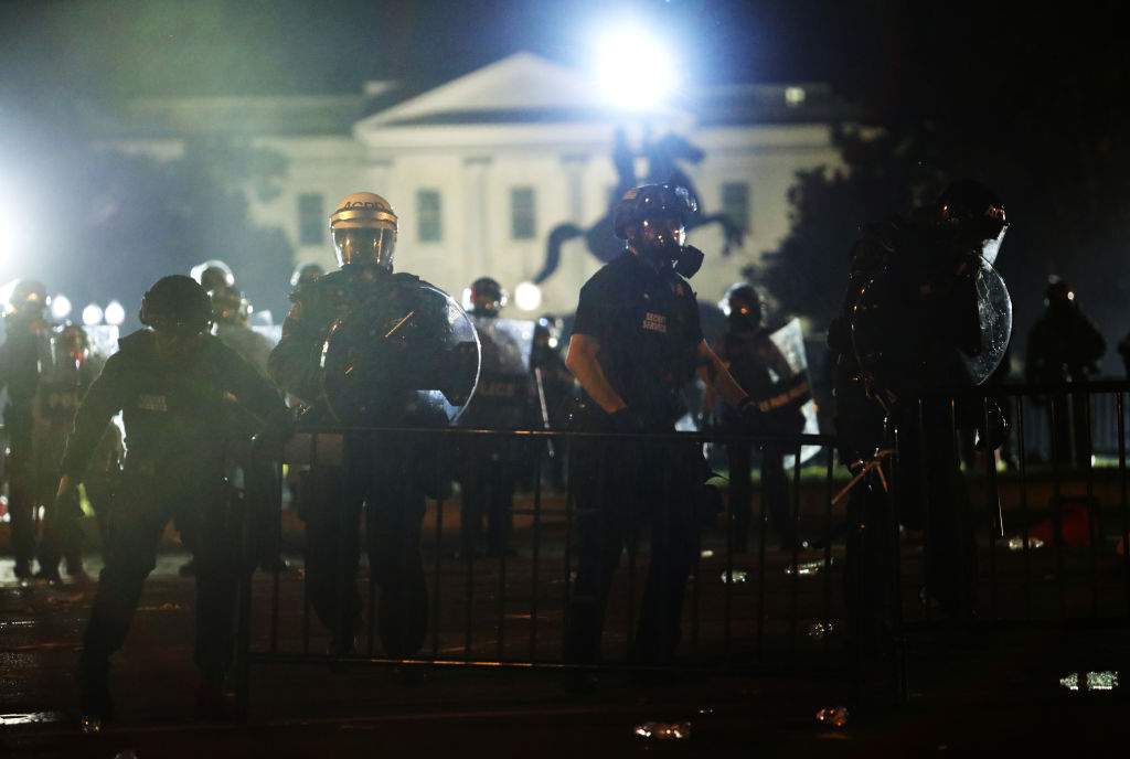 Police officers hold a perimeter during a protest near the White House in response to the killing of George Floyd on May 31, 2020, in Washington, D.C.