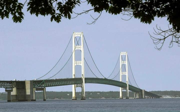  Officials tell the AP the agreement calls for shutting down the Line 5 pipes in the Straits of Mackinac connecting Lakes Huron and Michigan. 