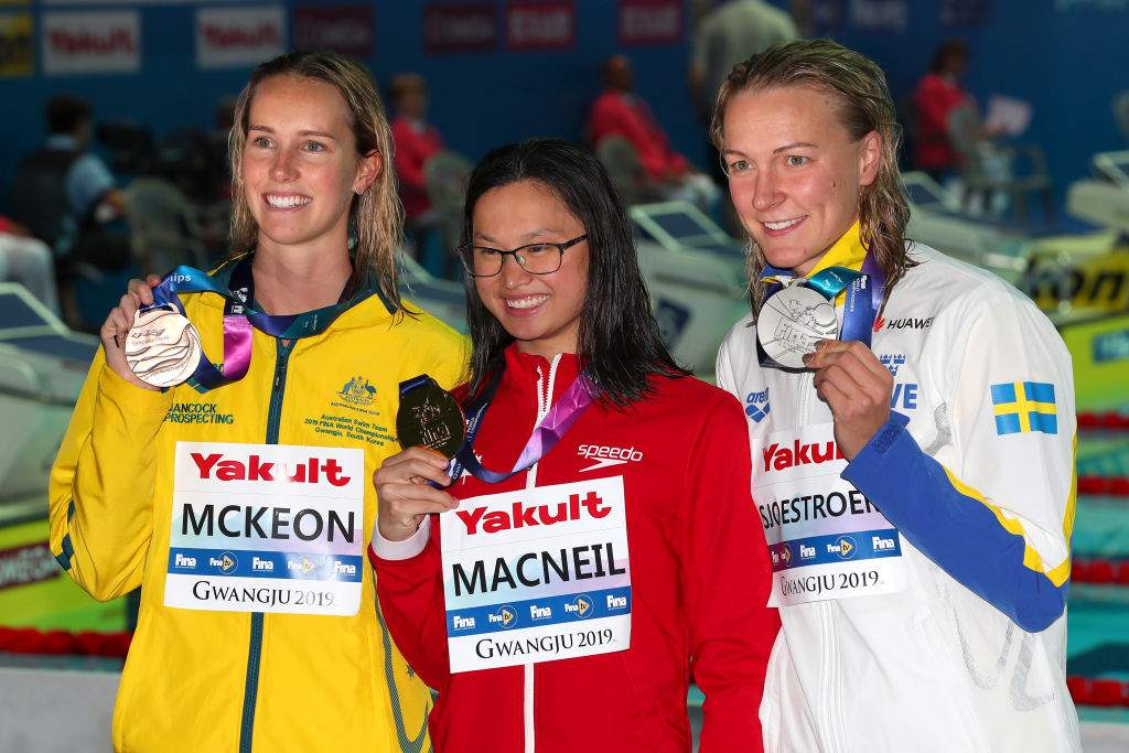 (L-R) Bronze medalist Emma McKeon of Australia, gold medalist Margaret MacNeil of Canada and silver medalist Sarah Sjostrom of Sweden pose during the medal ceremony for the Women’s 100m Butterfly Final on day two of the Gwangju 2019 FINA World Championships on July 22, 2019 in Gwangju, South Korea.
