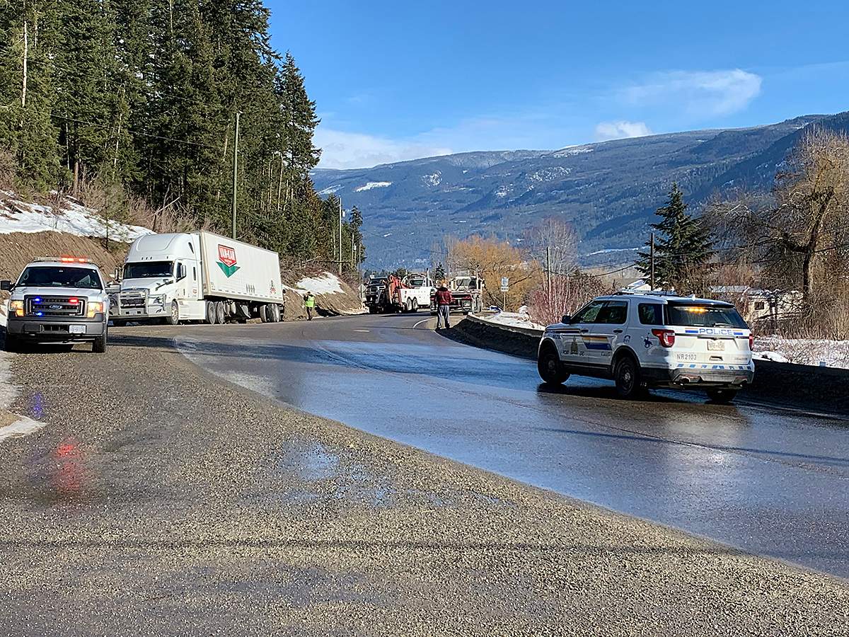 Another view of the Highway 97A closure involving a semi-truck hauling lumber that spilled its load.
