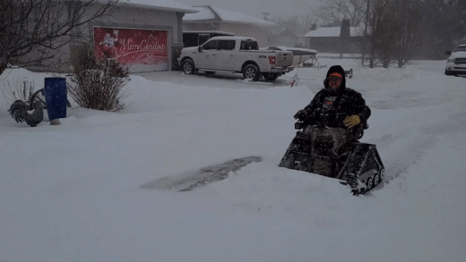 Bobbie Cherepuschak tests out the snow blade attachment on his new motorized wheelchair.