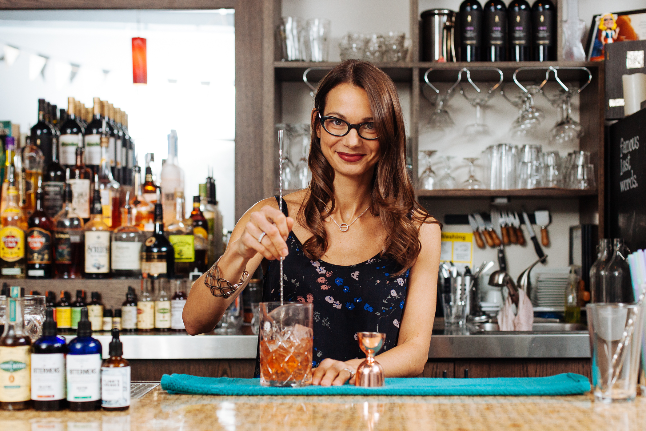Marlene Thorne mixing a "City on Fire" cocktail at Toronto cocktail bar Famous Last Words.