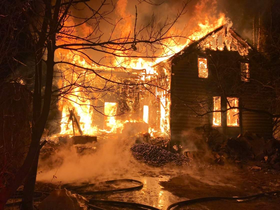 Sarnia fire crews on scene of a fully engulfed house fire on Churchill Line, near Telfer Road.