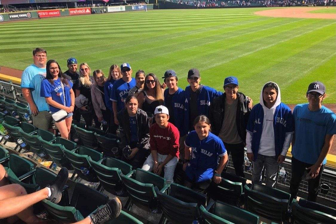 Shawn Auger with his family and friends at a Blue Jays game in Seattle.