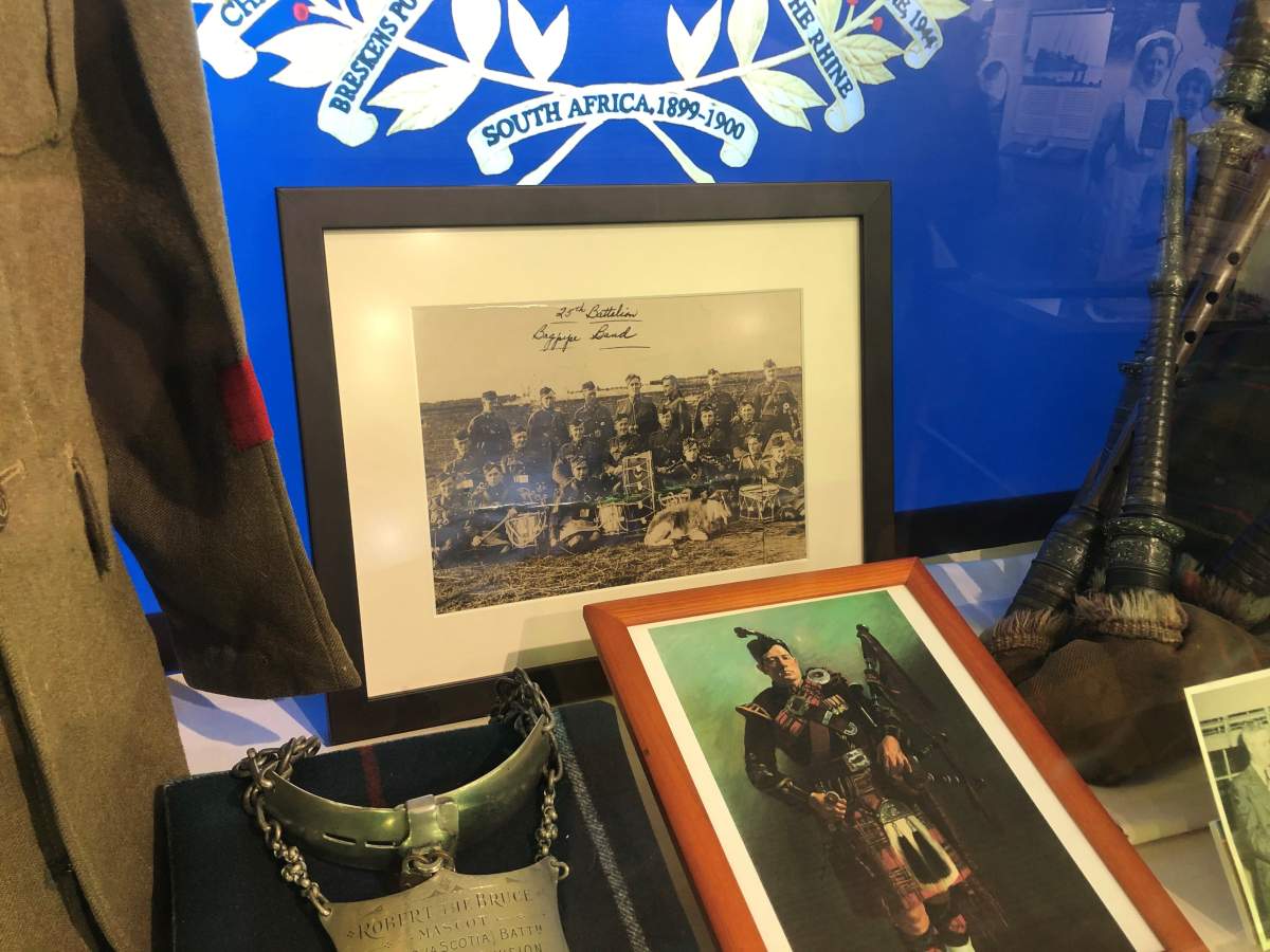 A photo of the 25th Battalion Nova Scotia Rifles pipe band, along with a photo of Pipe Master John Carson