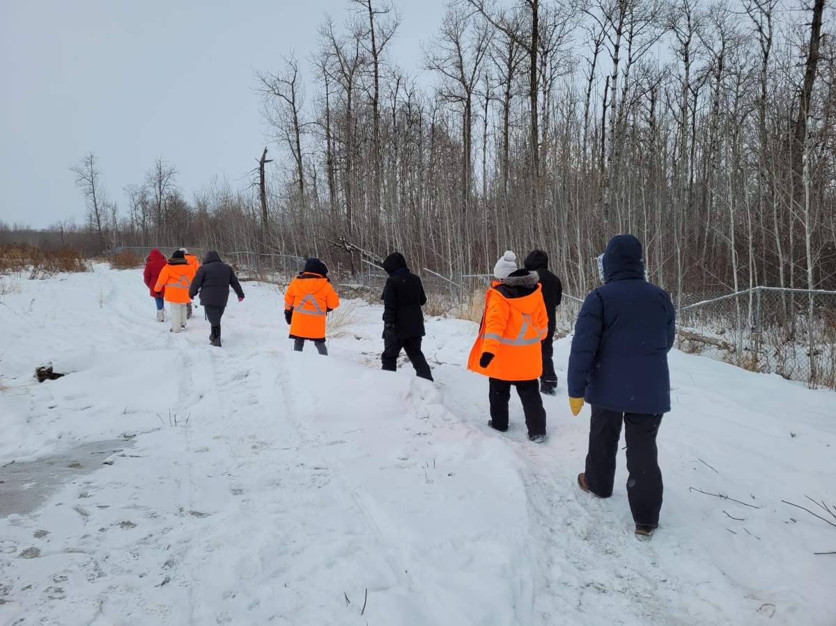 Family and community members search for missing woman Billie Johnson Friday, Feb. 12, 2021, days after a man was charged with second-degree murder in her death.