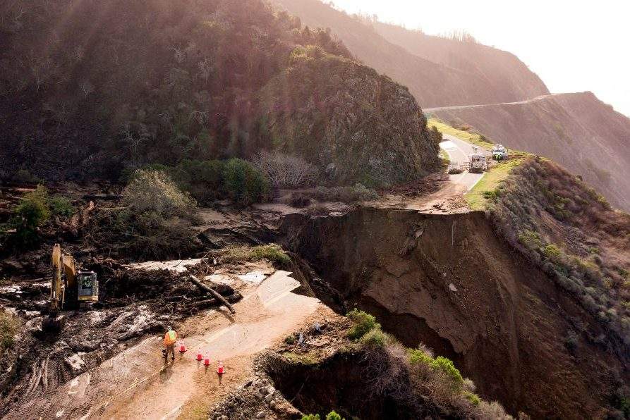 Construction crews work on a section of Highway 1 which collapsed into the Pacific Ocean near Big Sur, California on January 31, 2021.