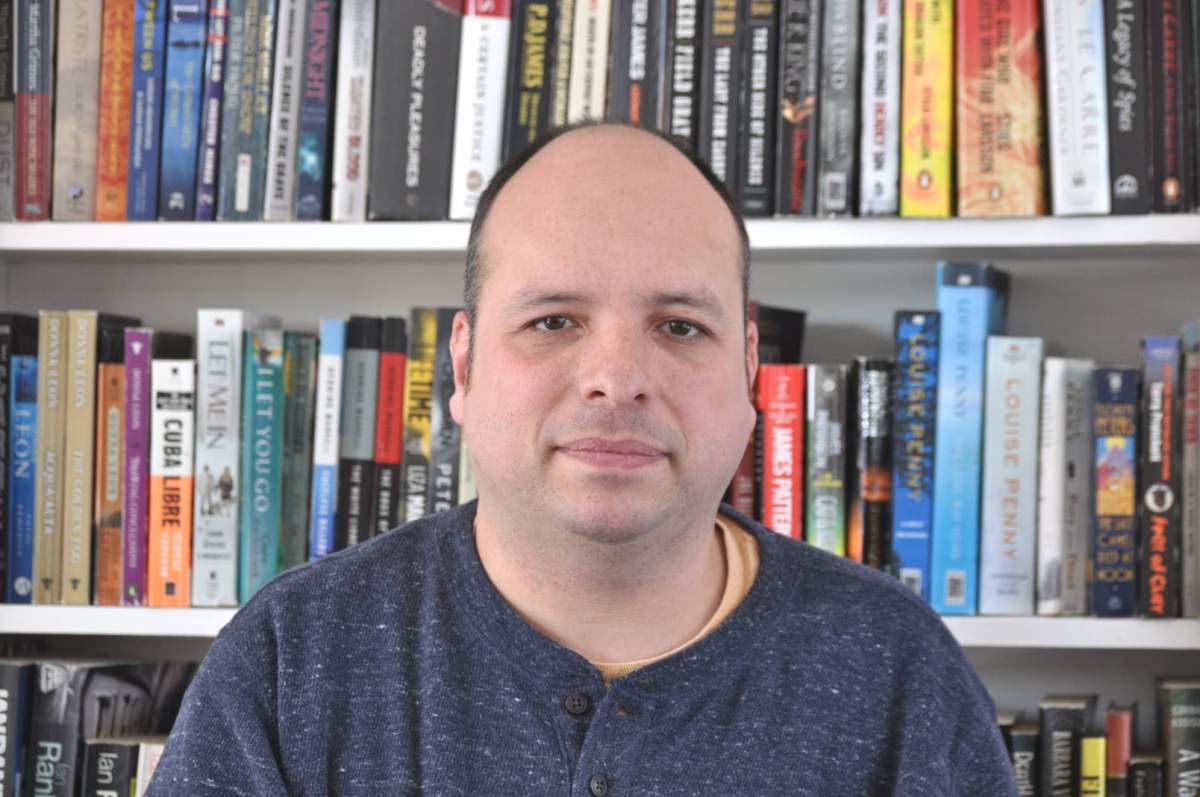 Town hall co-moderator Carlos Sosa.