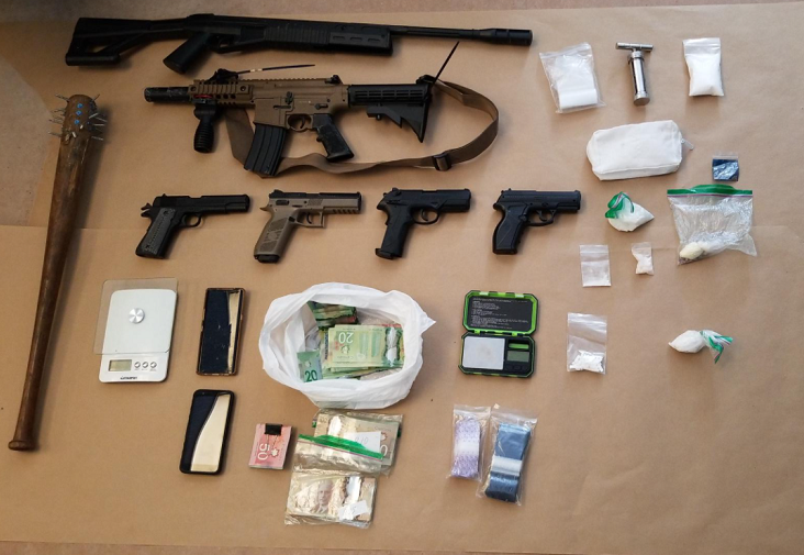 Kingston police executed three search warrants Wednesday, resulting in the seizure of drugs, weapons and cash. 