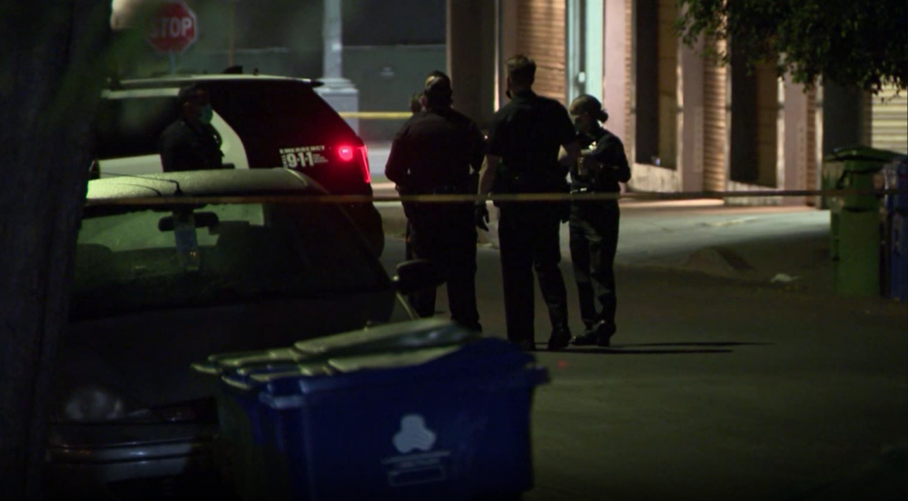 Police are shown at the scene of a shooting in Hollywood, Los Angeles, Calif., on Feb. 24, 2021.