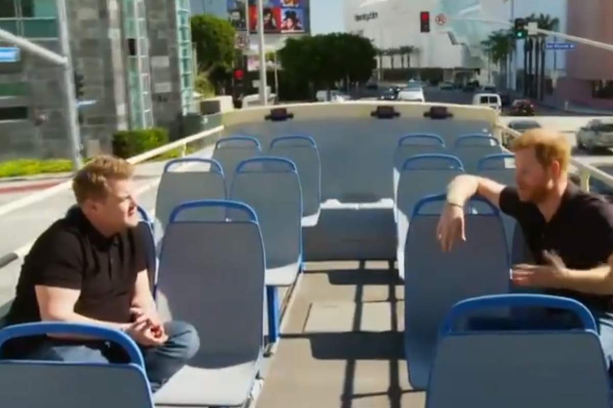 TV host James Corden, left, interviews Prince Harry on a bus in Los Angeles in this image from video aired on CBS’ ‘Late Late Show’ Feb. 25, 2021.