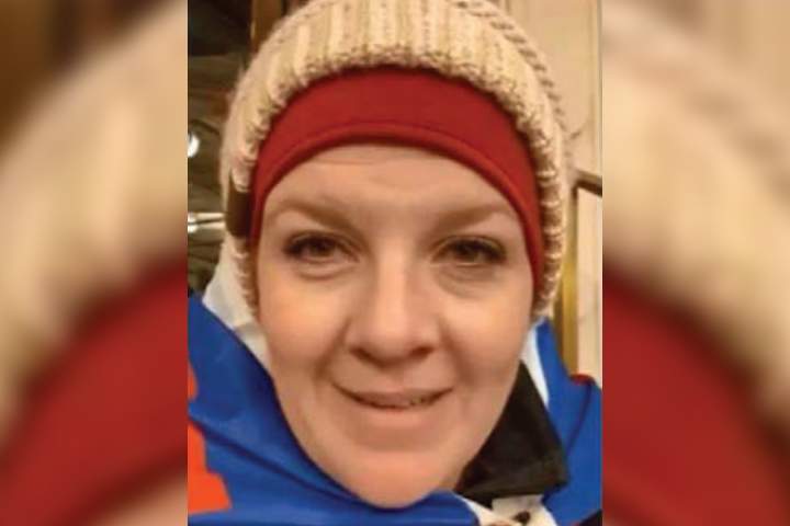 Jenny Cudd, of Midland, Texas, is shown inside the U.S. Capitol Rotunda after a mob breached it on Jan. 6, 2021, in this image from video on her Facebook page.