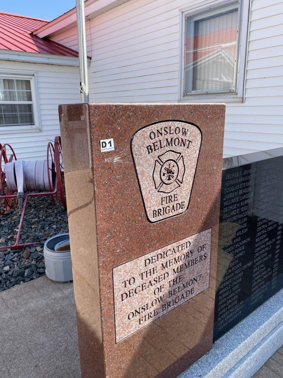 Photo of a damaged monument to fallen firefighters from the Onslow Belmont Fire Brigade.
