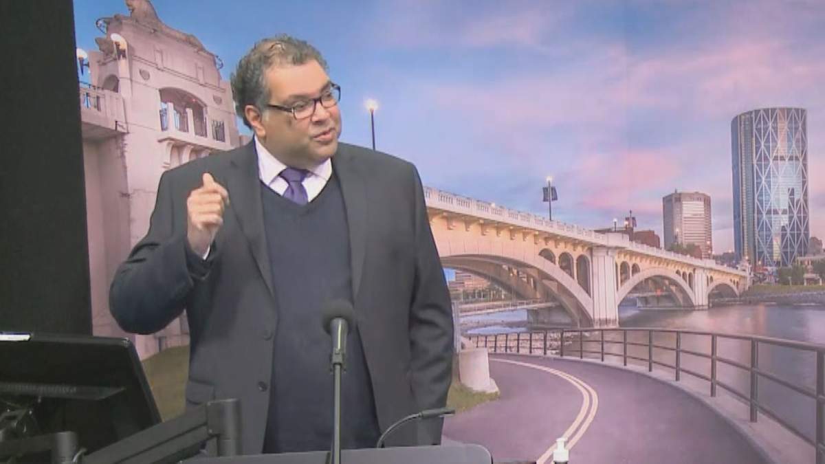 Calgary Mayor Naheed Nenshi announces the city's state of local emergency was extended, pictured on Feb. 23, 2021.